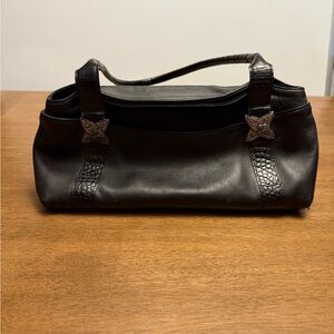Elegant Black Handbag with Decorative Accents